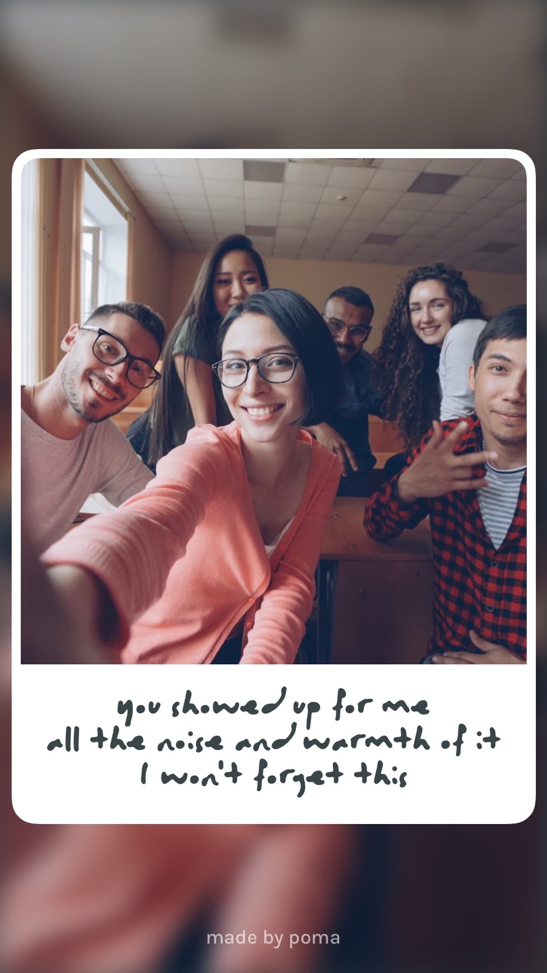 A group of friends crowded into a selfie, smiling